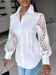 Elegant white long sleeve shirt for women featuring geometric lace hollow-out sleeve design