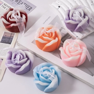 Handmade rose-shaped scented candles set in multiple colors with elegant ribbon bows