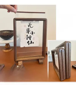 Detail of the side slot design on a walnut wood frame for easy transparent panel insertion