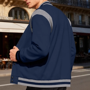 Men's navy blue and grey varsity baseball jacket with ribbed cuffs and hem