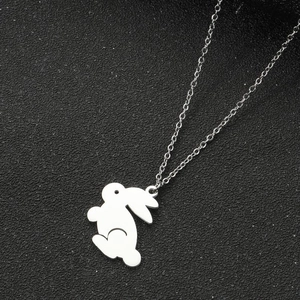 Detail of silver bunny silhouette pendant on a delicate stainless steel necklace chain