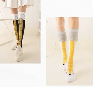 Close-up of creative chicken leg pattern over-the-knee socks with funny bird claw design