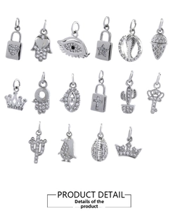 Detailed grid view of 18K gold plated charms including heart, hamsa, and evil eye shapes