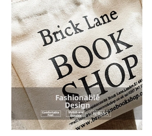 Close-up of durable canvas fabric texture with black Brick Lane Bookshop print