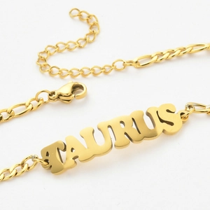 18K gold plated stainless steel Figaro chain anklet with Taurus zodiac nameplate