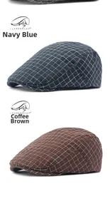 Detail view of cotton flat caps in navy and coffee featuring a fine plaid texture pattern