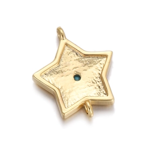 Detailed view of a gold-plated star pendant with hammered texture and blue center stone