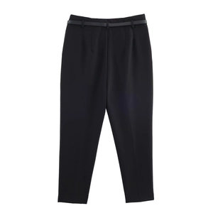 Detail view of high waist black straight leg trousers with minimalist skinny belt