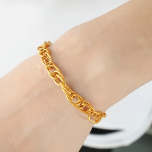 Hip-hop style gold chain bracelet with brushed finish shown on wrist for men and women
