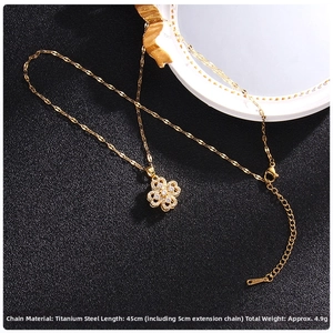 Detailed view of a titanium clover necklace with zircons, 45cm chain, 4.9g weight