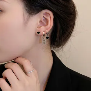 Silver needle heart stud earrings set with black heart pendants for minimalist style