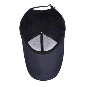 Navy blue baseball cap with long brim showing interior stitching and adjustable metal buckle