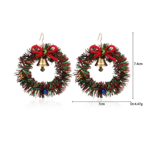 Detail view of Christmas wreath earrings with dimensions 7.4cm by 7cm on white background