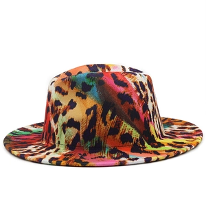 Macro view of multi-color leopard print texture on a high-quality wool fedora hat