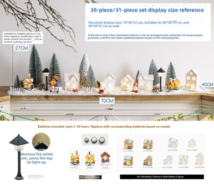 Detail of Christmas village set with LED houses, snow trees and miniature battery specs