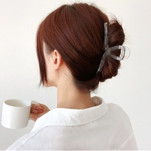 Large transparent square hair claw clip for women shown on model in minimalist style