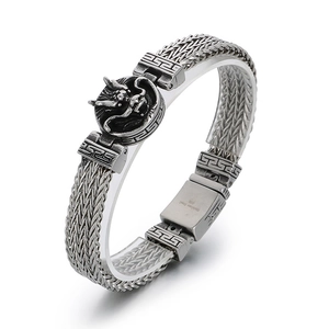Retro punk dragon-style titanium steel bracelet with detailed scales and engraved clasp