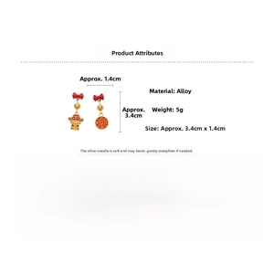 Detailed view of Chinese lion earrings with red bows and God of Wealth charms