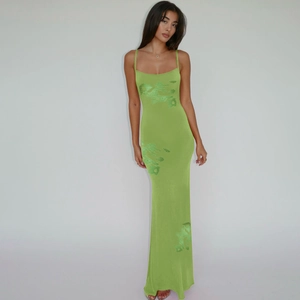 Grass green slim fit maxi dress with spaghetti straps and elegant floral print