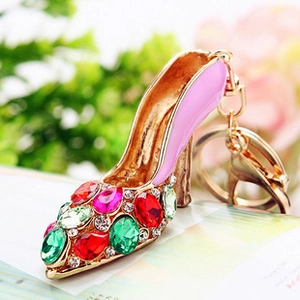 Detail of high heel keychain with multi-color crystals and pink enamel finish