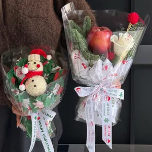 Christmas bouquet wrapping paper with festive snowman doll and fresh red apple gift set
