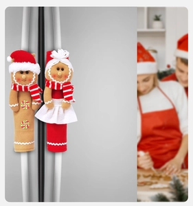Detail of Christmas gingerbread man plush covers for refrigerator door handles