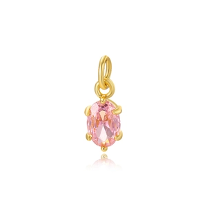 Detailed view of a gold pendant featuring a faceted oval pink zircon with a polished finish