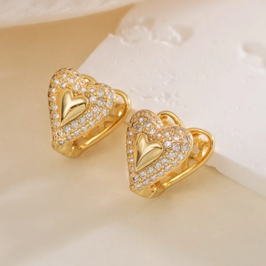 Luxury 18K gold plated heart earrings with sparkling zircon crystals on a stone base
