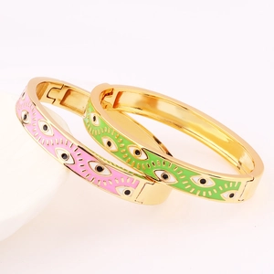 Gold-plated Evil Eye bangle bracelets with pink and green enamel in 2-piece set