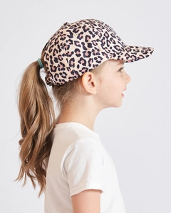 Close-up of kids ponytail baseball cap featuring a pink leopard print pattern design