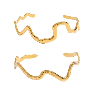 Polished and hammered gold wavy open bangles made of durable stainless steel