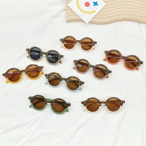 Kids round leopard print sunglasses with UV400 protection in multiple vibrant colors