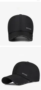 Detail view of black breathable quick-dry sports cap with FEWK lettering and laser-cut holes