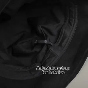 Detailed macro view of the inner adjustable drawstring for custom hat sizing