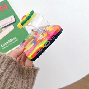 Detail of colorful wavy heart pattern iPhone case with transparent 3D bow stand