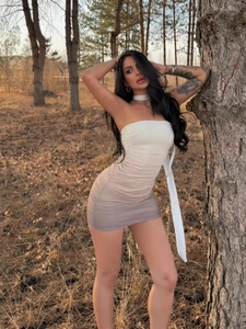 Sexy gradient tube mini dress with ruching and matching neckband in a forest setting