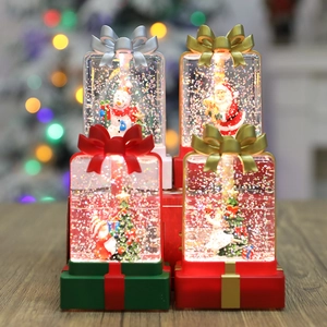 Christmas water-filled gift box lamp with Santa Claus and snowman inside for festive decor