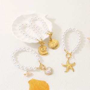 Bracelet Künstliche Perles Élégant Avec Künstliche Perle Imitation Acier Inoxydable Charm Coquillage Étoile De Mer Coeur Fermoir OT Plage Femmes