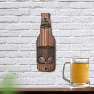 Wall-mounted beer bottle opener with wood frame and cap collector basket on white brick wall