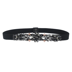 Elegant elastic belt with sparkling grey and pink crystals on black stretchy fabric