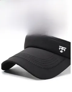 Close-up of a stiff black sun visor brim with reinforced stitching and logo detail