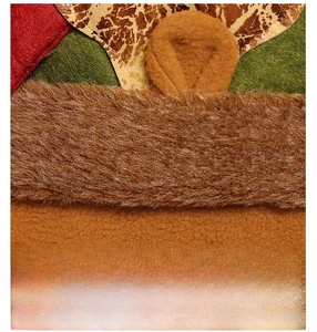 Close-up of festive chair cover showing soft plush fur, felt fabrics and detailed textures