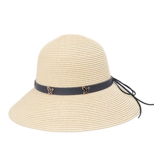 Beige wide brim straw sun hat with black leather band and golden butterfly buckle