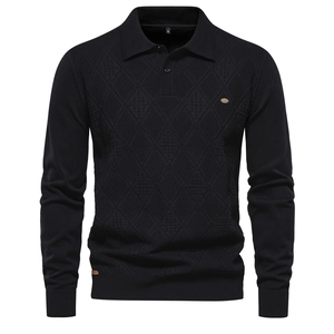Detailed close-up of black knitted polo sweater with diamond texture and button collar