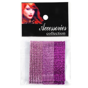 Detailed view of pink and purple glitter bobby pins in retail card packaging