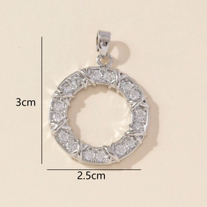 Detail view showing 3cm by 2.5cm dimensions of silver horseshoe zircon pendant