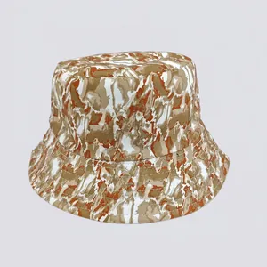 Detailed view of reinforced stitching on brim of marble pattern sun bucket hat