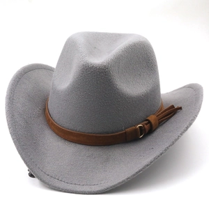Detail of grey wool cowboy hat with brown suede band and metal ring buckle decoration