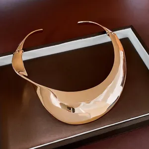 Exaggerated wide gold twisted metal choker necklace with luxury mirror plating for women