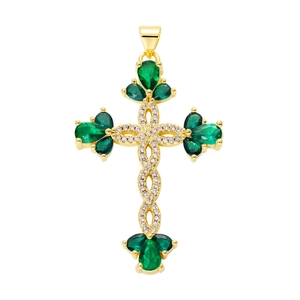 Close-up of gold cross pendant featuring green gemstones and sparkling micro-pave zircons